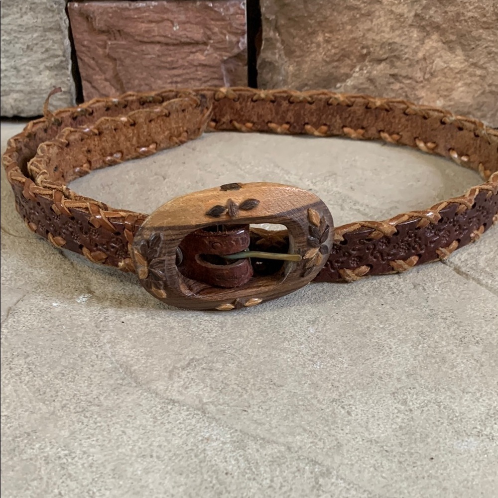 Leather tooled size small belt with wooden buckle